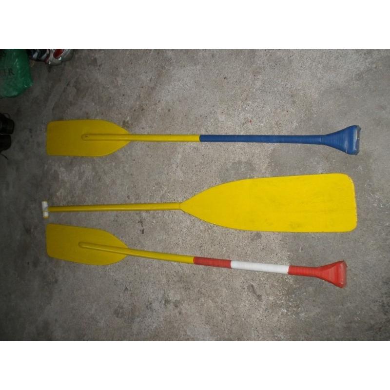 3 wooden paddles