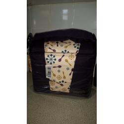 New unused munchkin travel booster seat