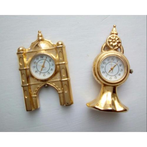 Two minature brass clocks