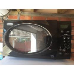 Black gloss delonghi microwave touch control operation. VGC. Can deliver 2 U