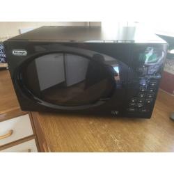 Black gloss delonghi microwave touch control operation. VGC. Can deliver 2 U