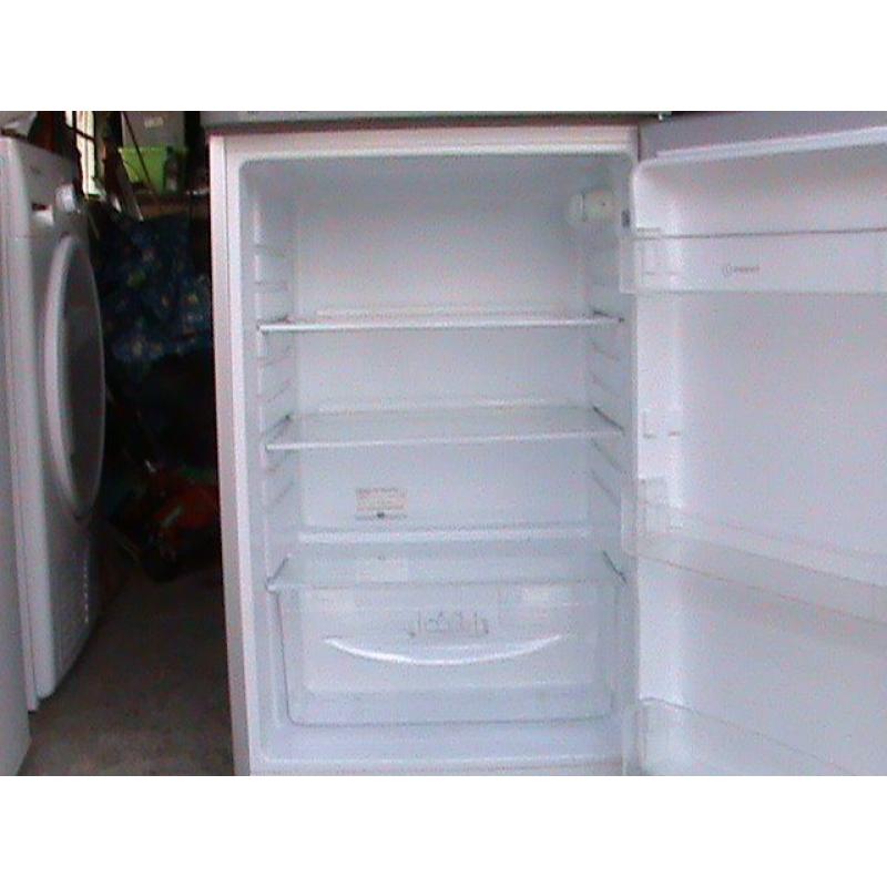 Indiset Seperate fridge and freezer can be seen working.