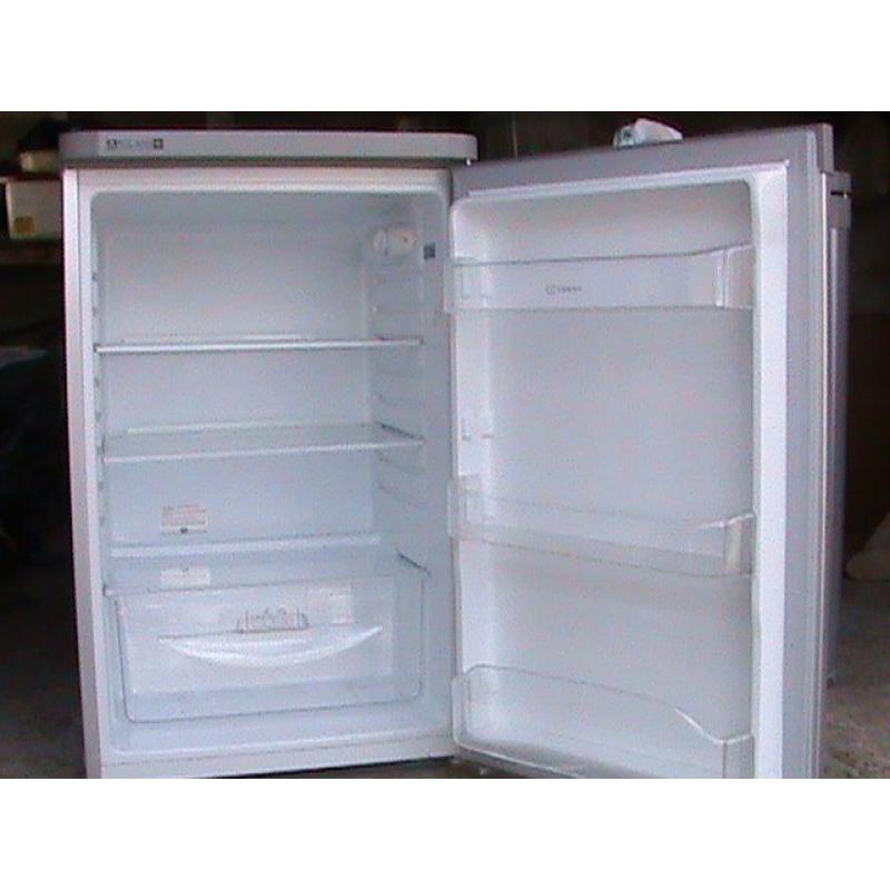 Indiset Seperate fridge and freezer can be seen working.
