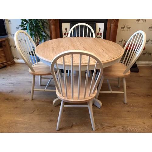 Solid wood dining table with four chairs