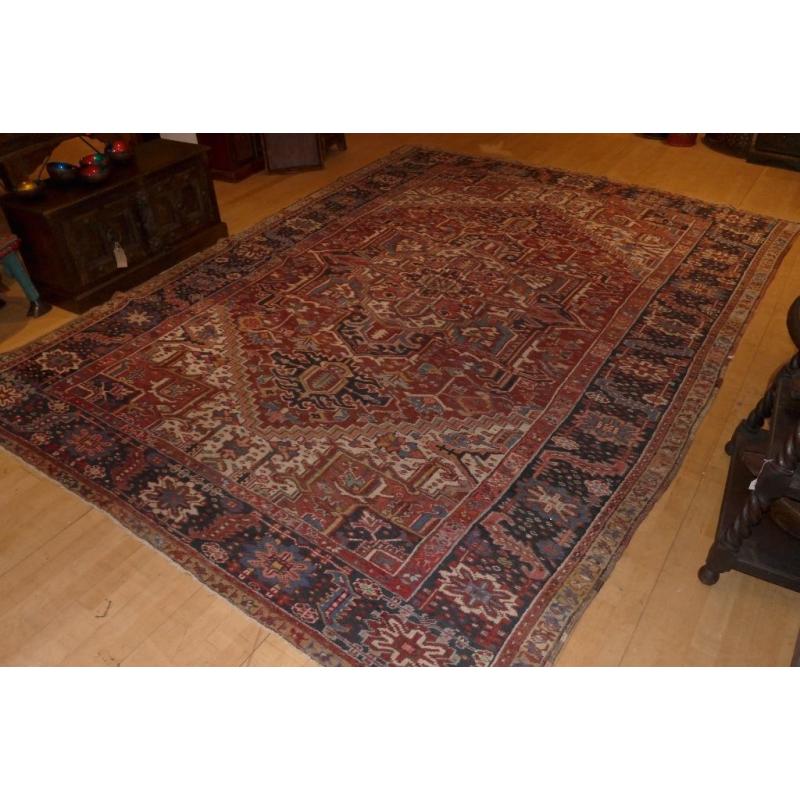 70 year old large Heriz rug