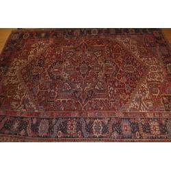 70 year old large Heriz rug