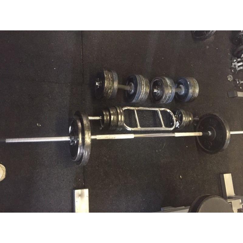 100 kg of weights plus bars