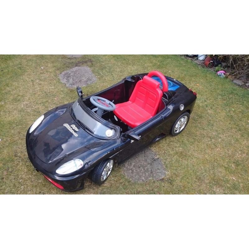 BLACK RIDE ON CAR