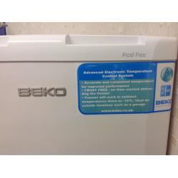 Beko frost free, free standing white freezer, five drawers