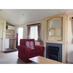 Large spacious static caravan for sale at Pease Bay in Berwickshire on the beach. Free site fees.