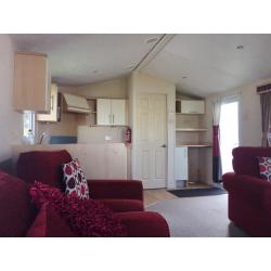 Large spacious static caravan for sale at Pease Bay in Berwickshire on the beach. Free site fees.