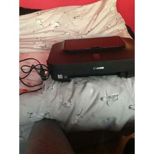 Canon printer with instructions and charger