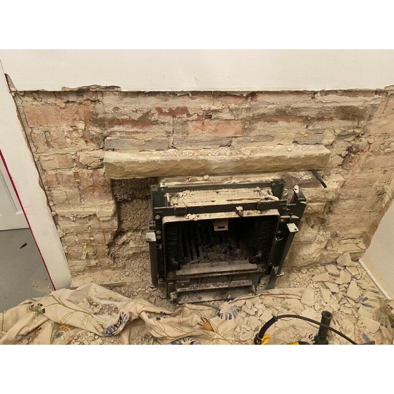 Solid fuel back boiler