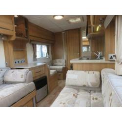 2011 COACHMAN VIP 520/4 4 BERTH CARAVAN WITH SIDE DINETTE AND END WASHROOM......