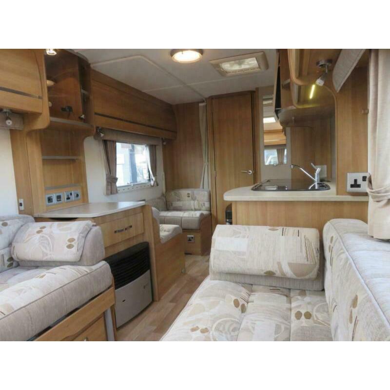 2011 COACHMAN VIP 520/4 4 BERTH CARAVAN WITH SIDE DINETTE AND END WASHROOM......