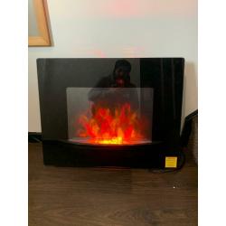 Electric wall mountable fire with remote control