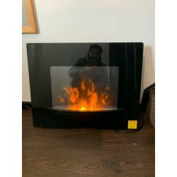 Electric wall mountable fire with remote control