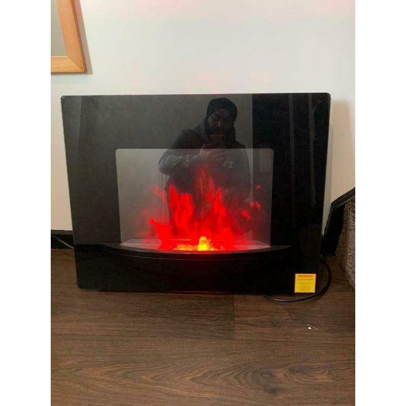 Electric wall mountable fire with remote control