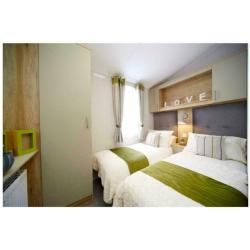 New 2 bedroom home, 12 month season park, free golf & leisure included