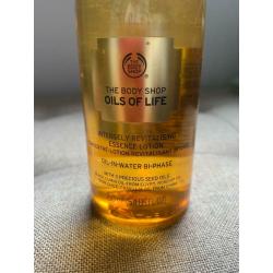 Body shop oils of life intensely revitalising essence lotion