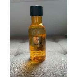 Body shop oils of life intensely revitalising essence lotion