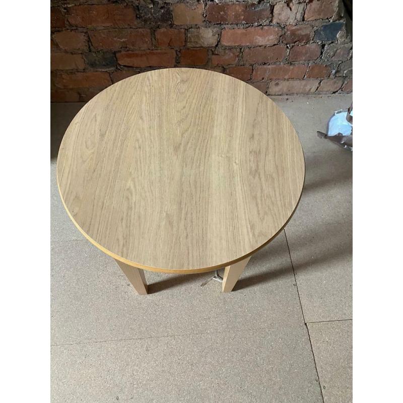 for sale round light wood table in very good condition
