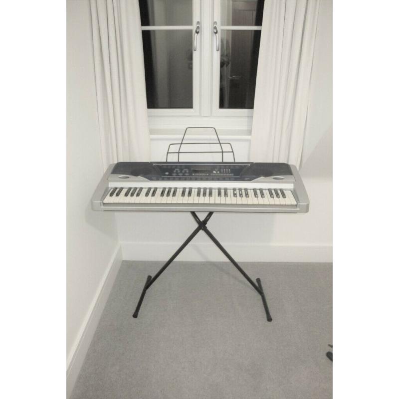 Burswood 61 key electronic keyboard with stand, mains adapter, and manual.