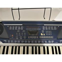 Burswood 61 key electronic keyboard with stand, mains adapter, and manual.
