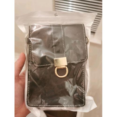 Brand new leather strap small bag