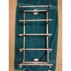 Towel rails and toilet roll holder