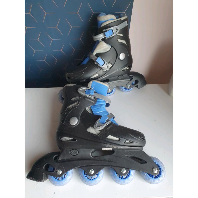 Kids inline Roller boots sizes between 2/3/4 in good used condition