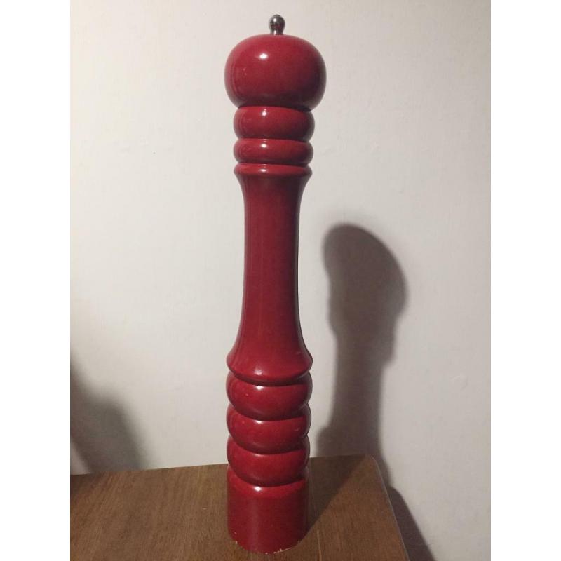 Very tall wooden pepper mill
