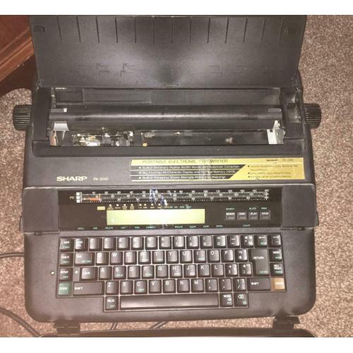 Sharp portable electronic typewriter